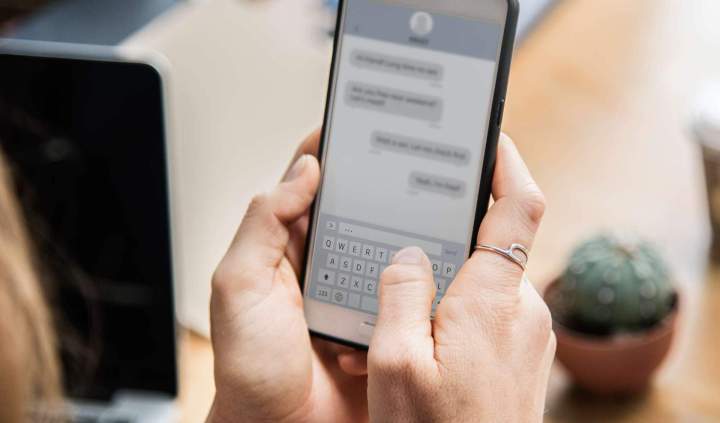 woman chatting her smartphone